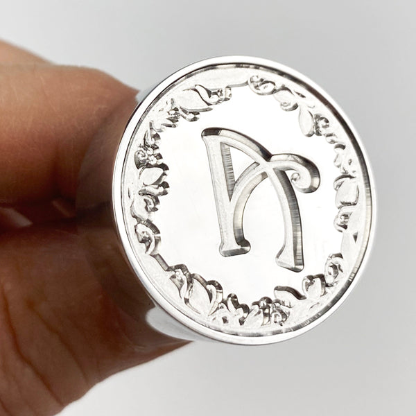 Harrington font wax seal stamp avaiable in your choice of initial.  Pictured is A with the ivy border.  Created by letterseals.mom.